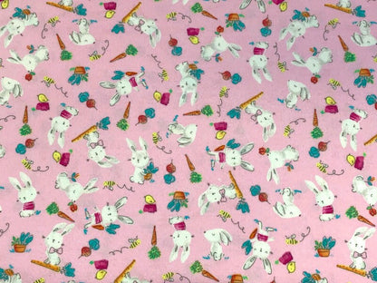 Flannel Bunny Fabric Sold by the YARD. 100% Cotton Easter Fabric. White Rabbits on Pink, Green Accents. For Quilts, Clothing, Nursery Décor.