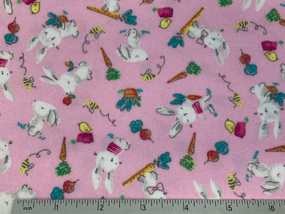 Flannel Bunny Fabric Sold by the YARD. 100% Cotton Easter Fabric. White Rabbits on Pink, Green Accents. For Quilts, Clothing, Nursery Décor.